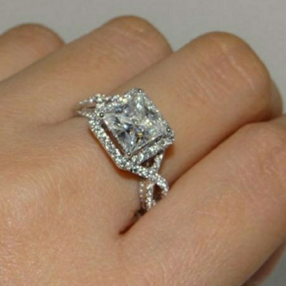 White Sapphire solitare 925 SP stamped ring.